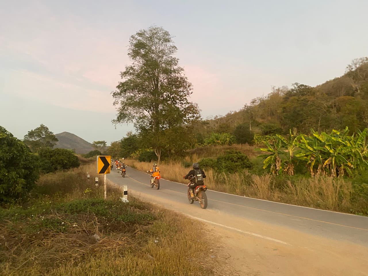 Pai Hot Springs at dusk — a steaming geyser on the side of the road, useful for stretching.