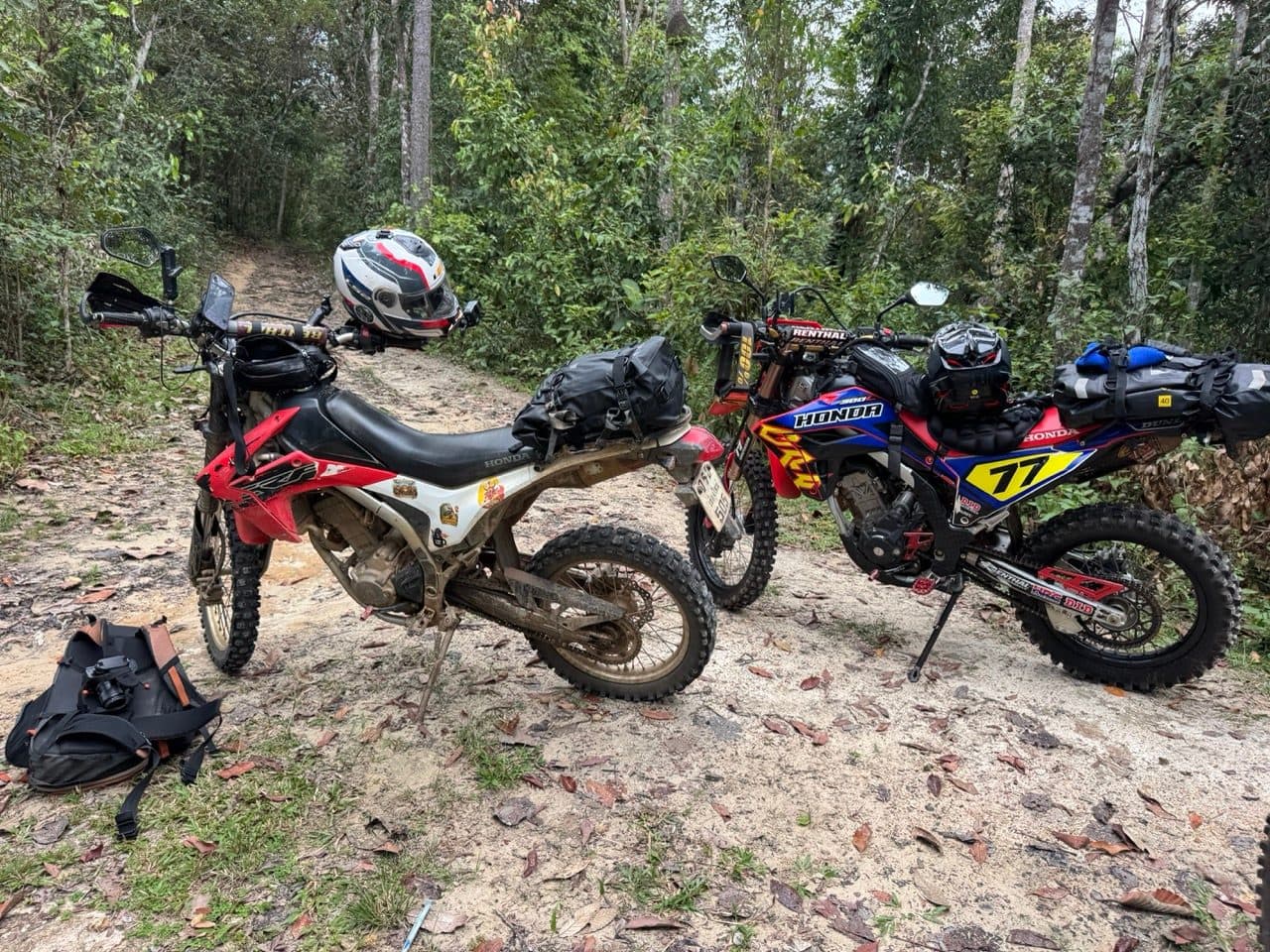 Three of the four parked up on the forest two-track out of Samoeng Tai